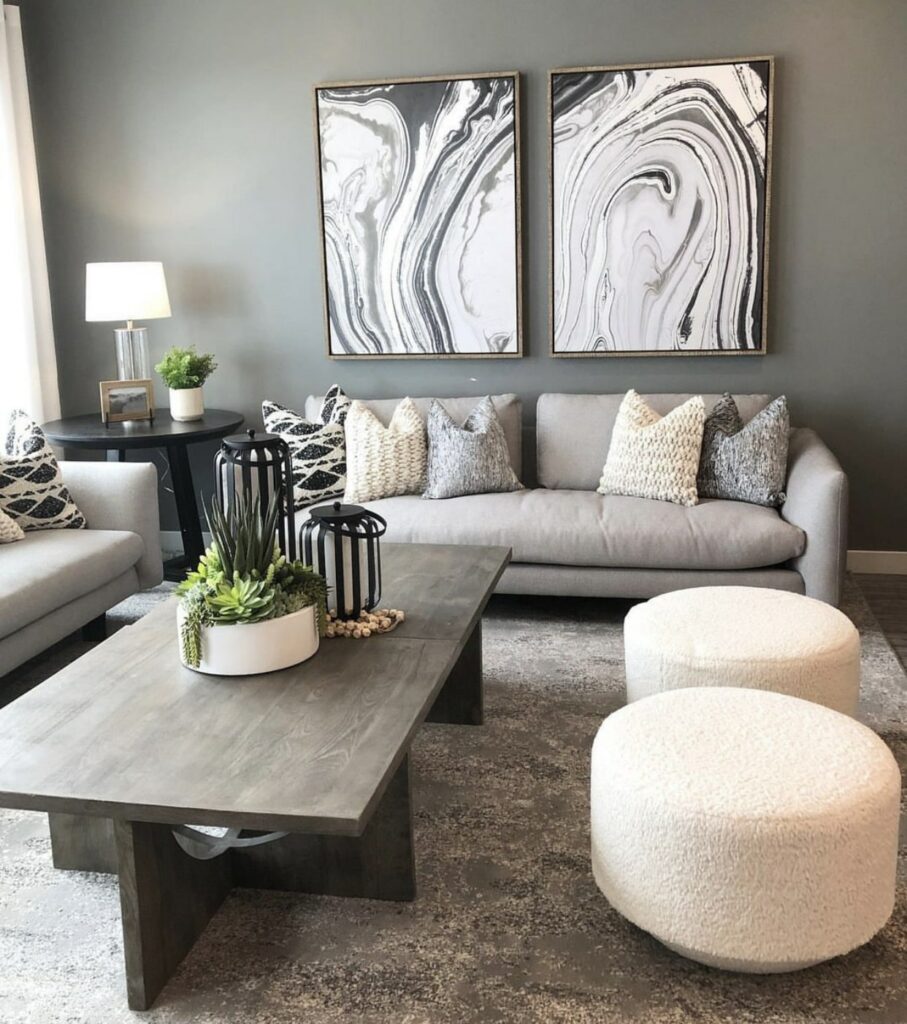 redefined monochromatic neutral living room with modern art and white ottomans