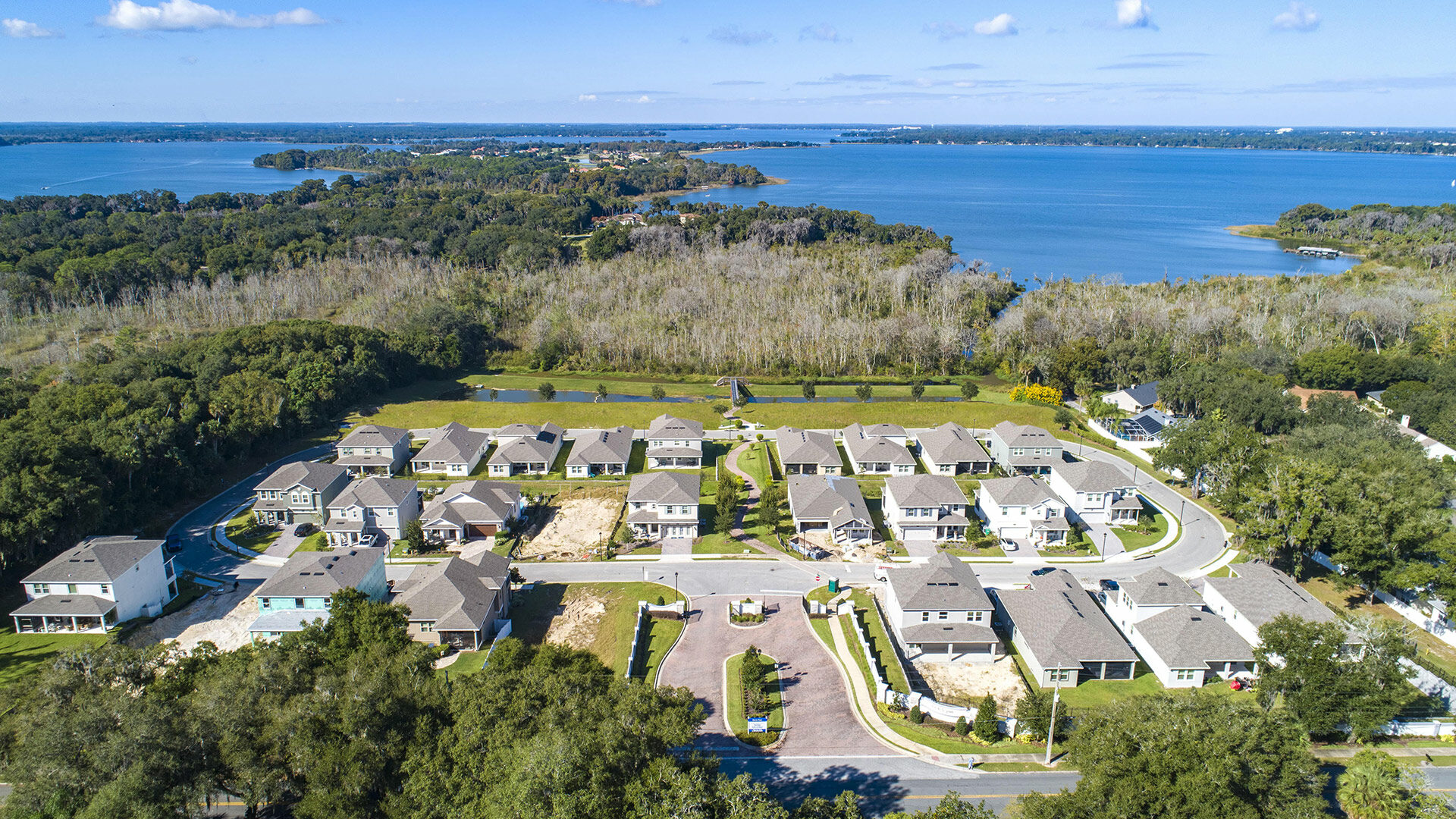 Lennar community aerial shot by the water
